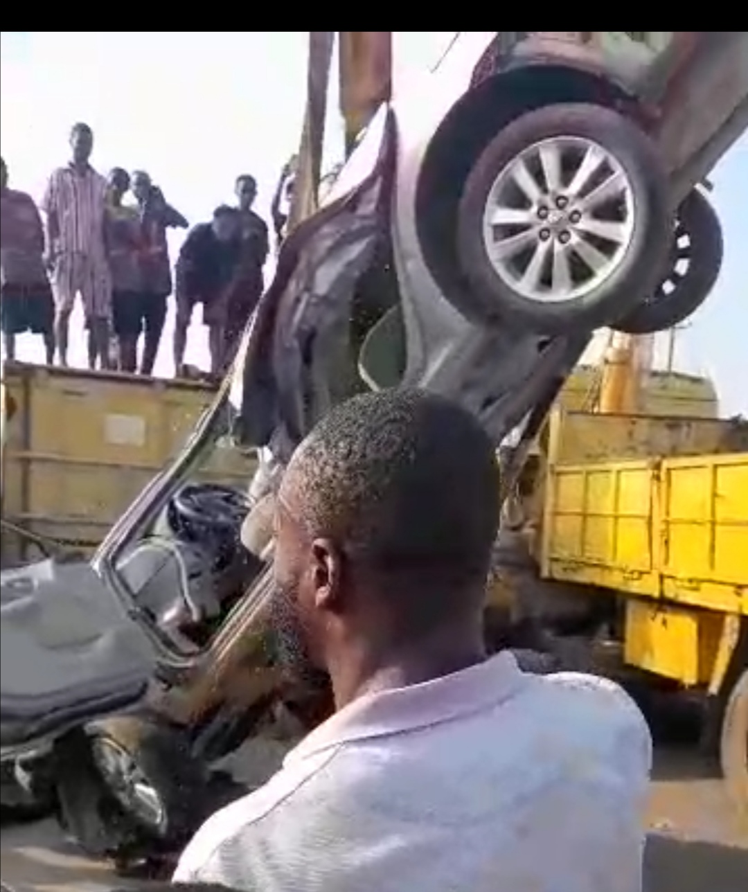 driver-escapes-death-as-40-feet-container-falls-on-car-in-lagos.jpg