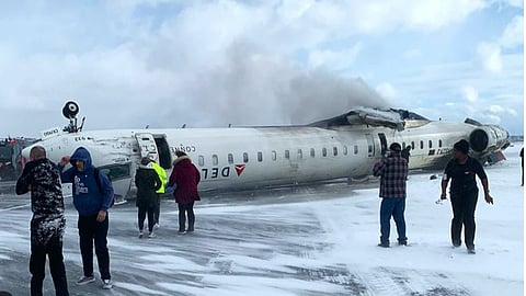 delta-jet-flips-upside-down-on-snowy-toronto-runway-all-80-aboard-survive.jpg