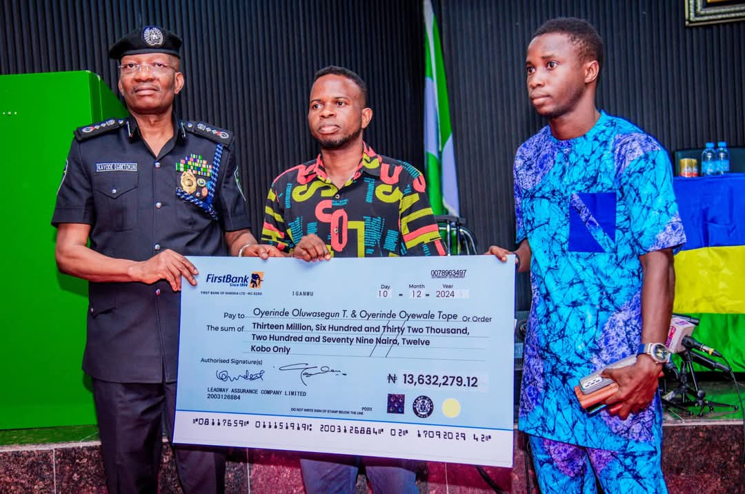 igp-egbetokun-presents-insurance-cheques-to-families-of-fallen-officers.jpg