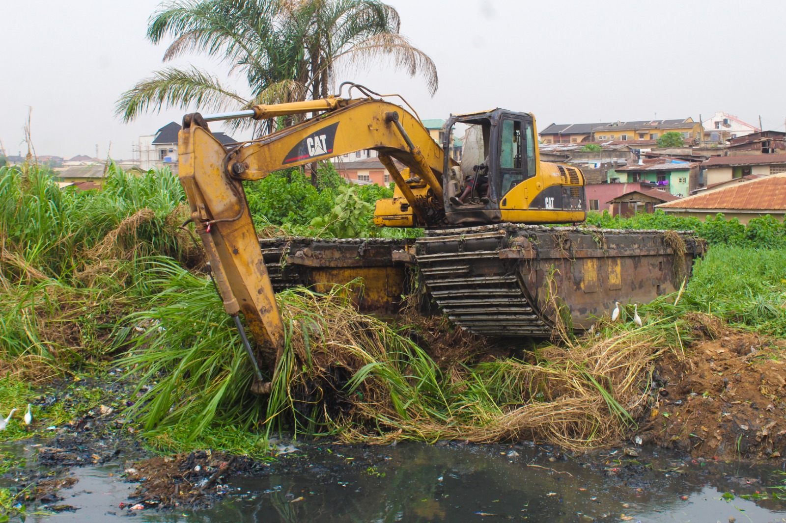 channelization-of-primary-drainage-extends-with-silt-evacuation-to-alagbole-under-bridge.jpg